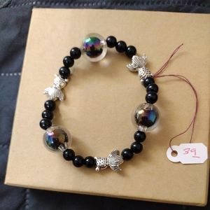Artemis's Gems custom-made beaded bracelet with metal fish and bubble beads